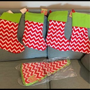 4 stockings and 1 tree skirt